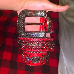 Bb Simon belt lavasan-red snake size 34,it has some scratchers on the buckle